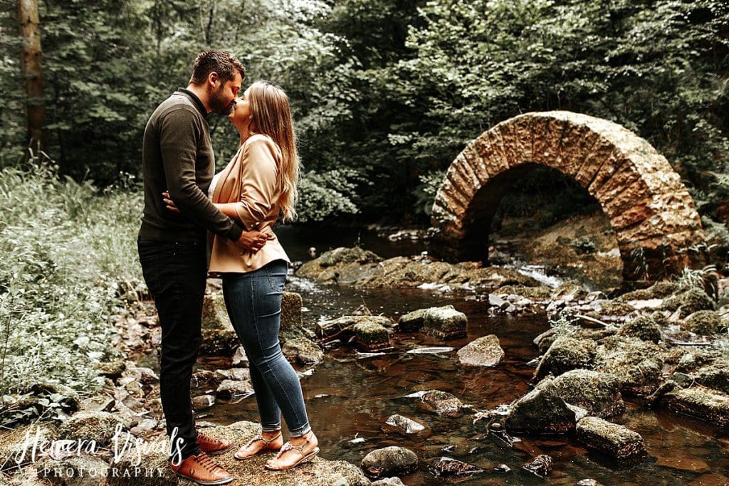 Drumlanrig castle striding arch couple engagement